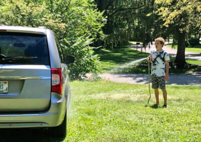 Sally's son, Kaegen helping out at the car wash project